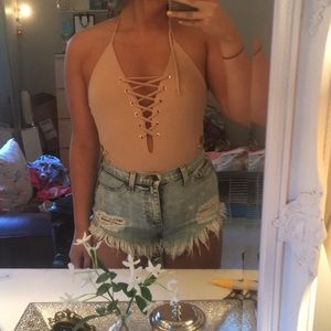 nude lace up swim suit
